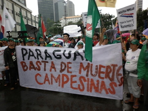 Peasant organisations affiliated with La Via Campesina Paraguay march at the People's Summit at Rio+20 in June 2012. They were protesting the killing of 11 peasants at Curuguaty a few days earlier. (Photo: GRAIN)