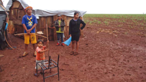 Indigenous communities displaced from their land by the expansion of agribusiness in Mato Grosso do Sul, Brazil. (Photo: Cristiano Navarro)