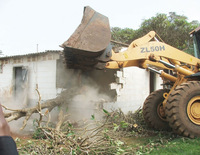 1,750 families were left homeless when the Nakawa-Naguru estates where Ochen Solomon lived were razed to create space for a new housing development. (Photo: Hurinet)