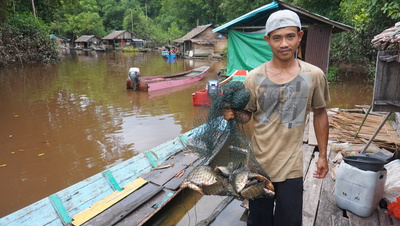 Sungai beracun: Perlawanan untuk merebut kembali air dari perkebunan kelapa sawit di Indonesia-image